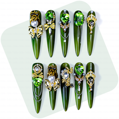 Emerald Royale – Deep Forest Green Long Stiletto Press-Ons with Emerald Gems, Gold Crown & Bow Charms