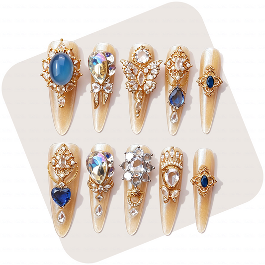 Made-to-Order | Sapphire Princess – Nude Pearl Shimmer Long Stiletto Press-Ons with Blue Gem Charms