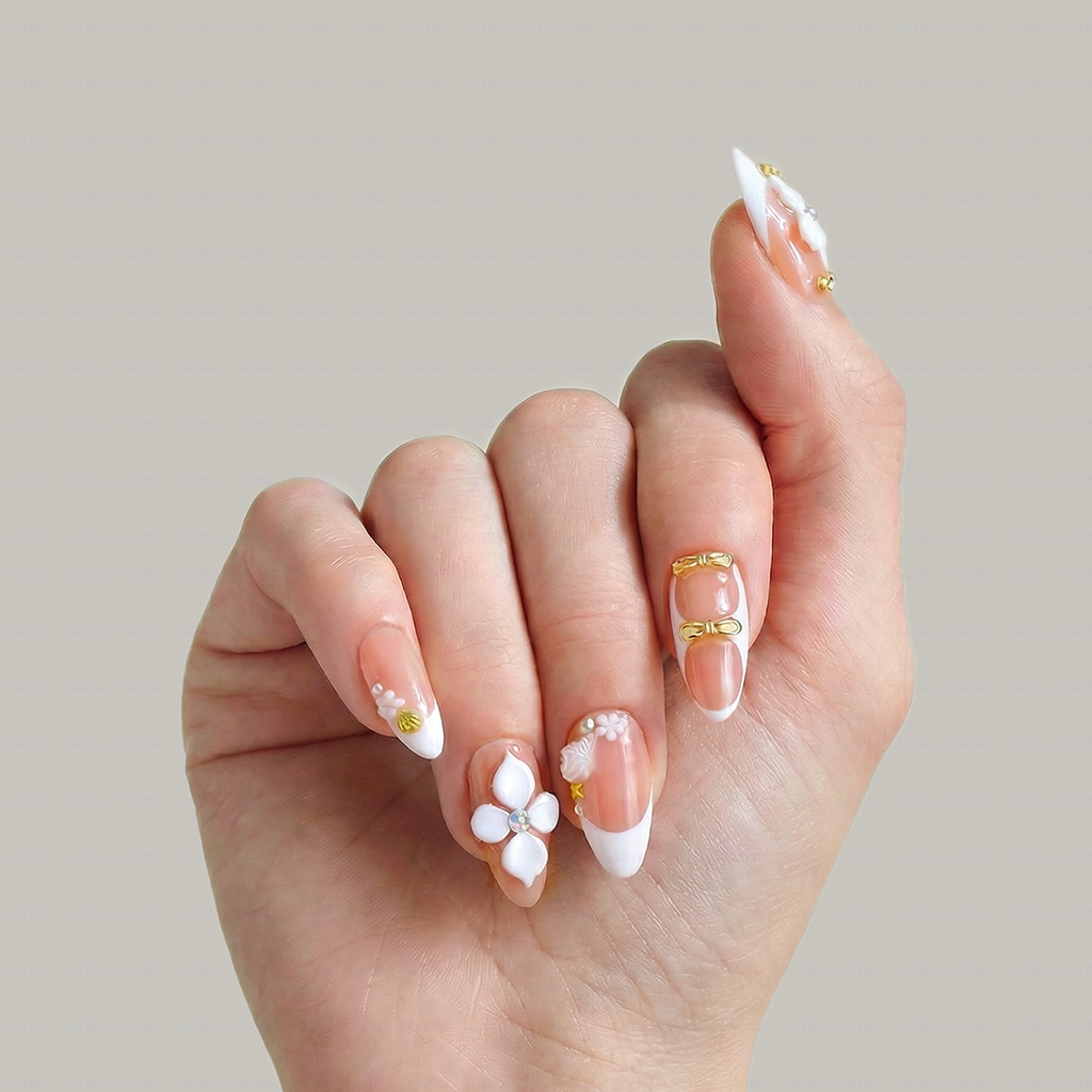 Peach Whisper – Soft Peach Short Almond Press-Ons with 3D Flower, Gold Bow & French Tip Detail