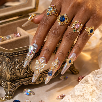 Made-to-Order | Sapphire Princess – Nude Pearl Shimmer Long Stiletto Press-Ons with Blue Gem Charms