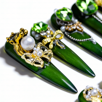 Emerald Royale – Deep Forest Green Long Stiletto Press-Ons with Emerald Gems, Gold Crown & Bow Charms
