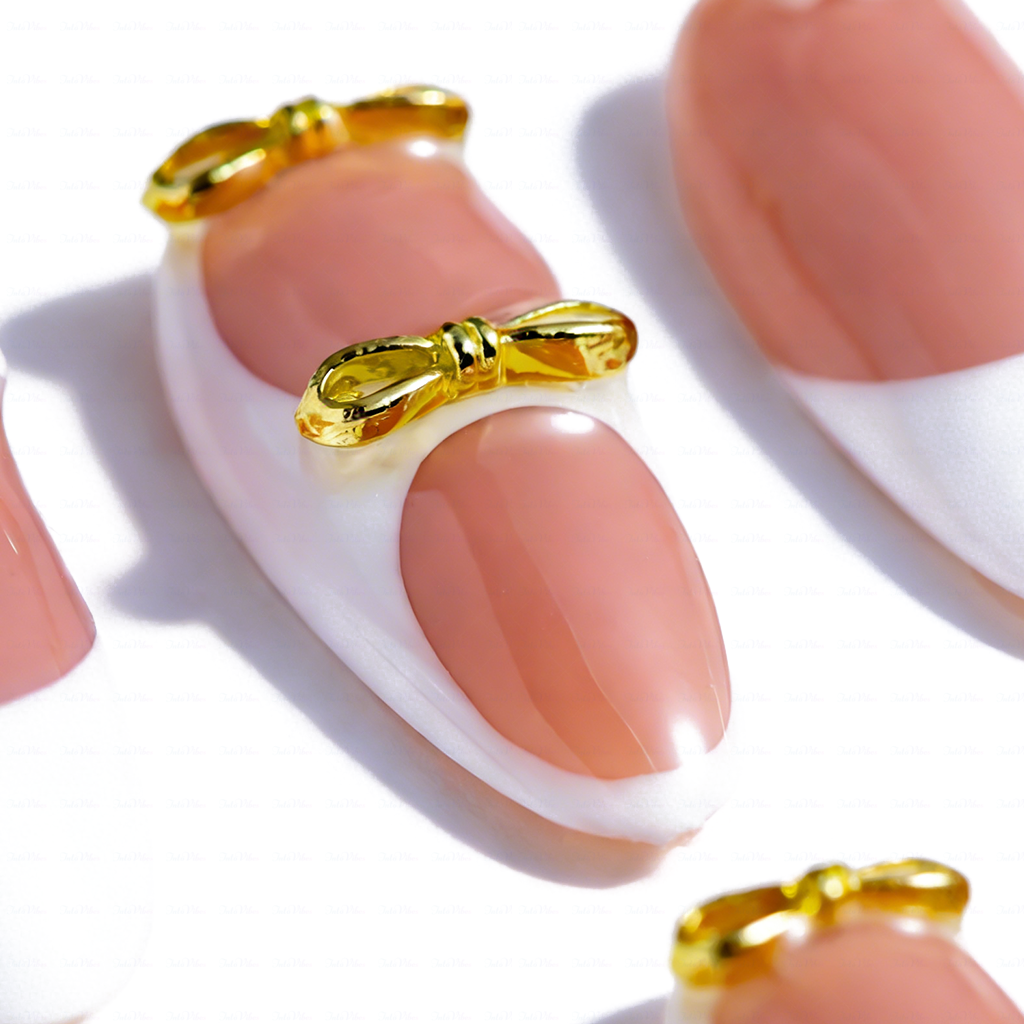 Peach Whisper – Soft Peach Short Almond Press-Ons with 3D Flower, Gold Bow & French Tip Detail