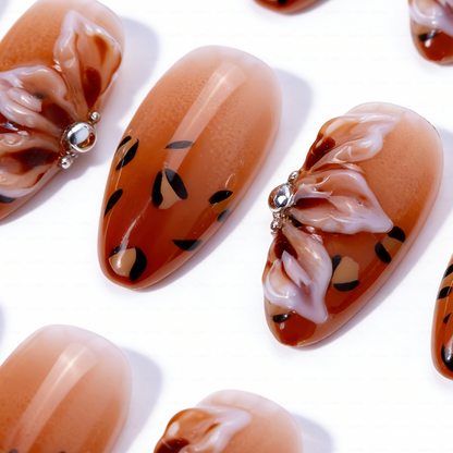 Caramel Bow – Amber Brown Short Almond Press-Ons with Leopard Print & 3D Bow Accents