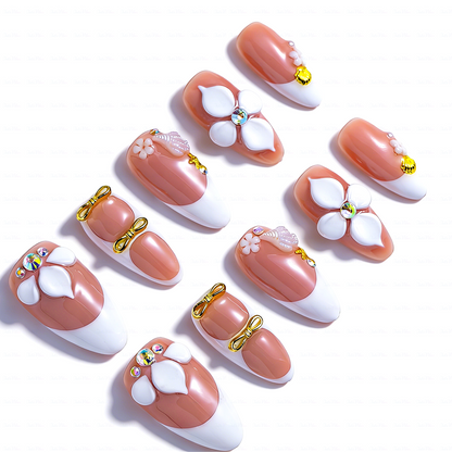 Peach Whisper – Soft Peach Short Almond Press-Ons with 3D Flower, Gold Bow & French Tip Detail