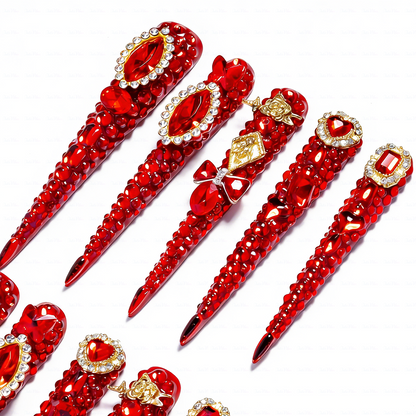 Ruby Royale – Crimson Red Long Stiletto Press-Ons with Rhinestone Halo, Heart Gem & Gold Bow Charms