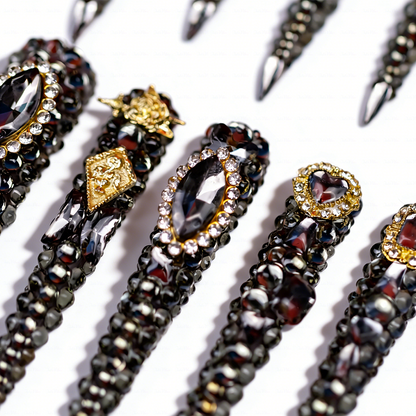 Noir Bling – Gunmetal Black Long Stiletto Press-Ons with Full Rhinestone & Vintage Gold Accents