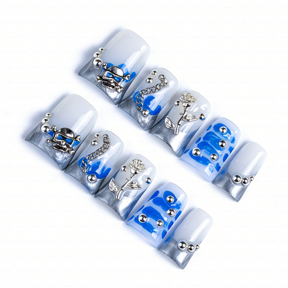 Chrome Vortex – Blue & Silver Short Duck Press-Ons with 3D Chain & Metal Accents